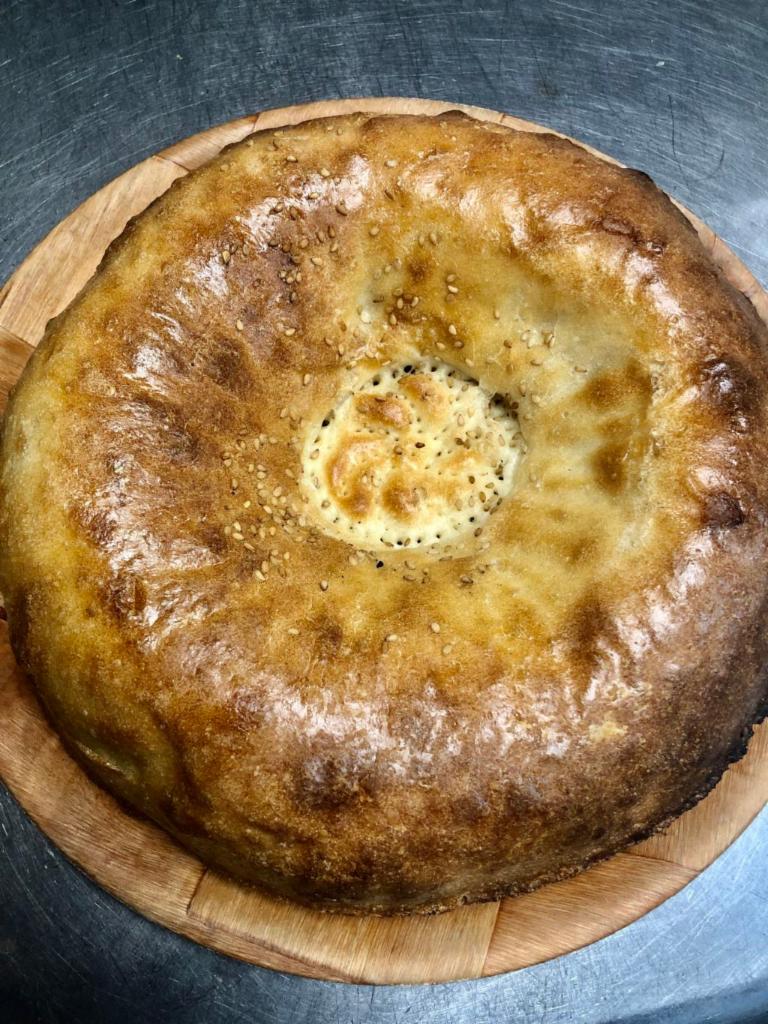 National Tandoori Bread · Round bread baked in a traditional tandoor.