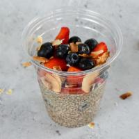 Chia Pudding  · Almond milk, chia pudding, vanilla, cinnamon, topped with berries and coconut. Vegan.
