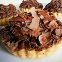 Chocolate Peanut Butter Tart · A buttery tart shell with a peanut butter filling dipped in a chocolate ganache
