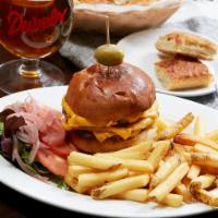 Angus Cheeseburger · Two 5 oz Angus Beef Patties on a toasted brioche bun with American cheese. Served with frenc...