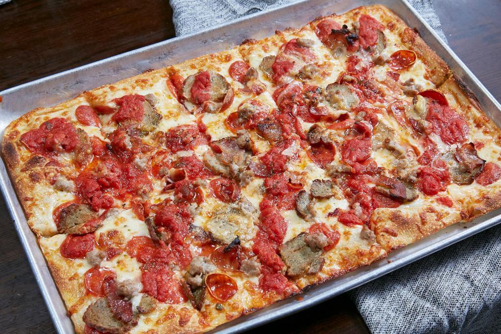 The Meat Lover Pizza · Pepperoni, sausage, meatballs, crispy bacon, fresh mozzarella, and tomato sauce.