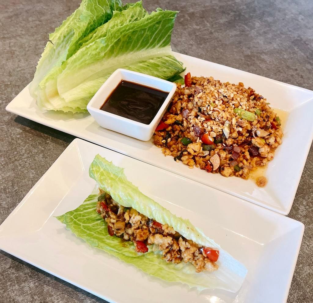 Chicken Lettuce Wrap  · Minced chicken stir-fried with garlic, green onions, red pepper served with fresh leaves of lettuce, and special dipping sauce.