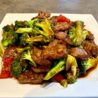 Broccoli with Beef · Broccoli, red onions, red bell peppers stir-fried with beef in a brown sauce.