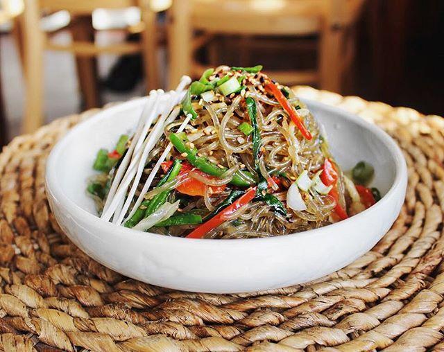 15. Glass Noodles (Japchae) · Glass noodles made from sweet potatoes with seasonal vegetables and flavored with soy sauce and stir fried with sesame oil.