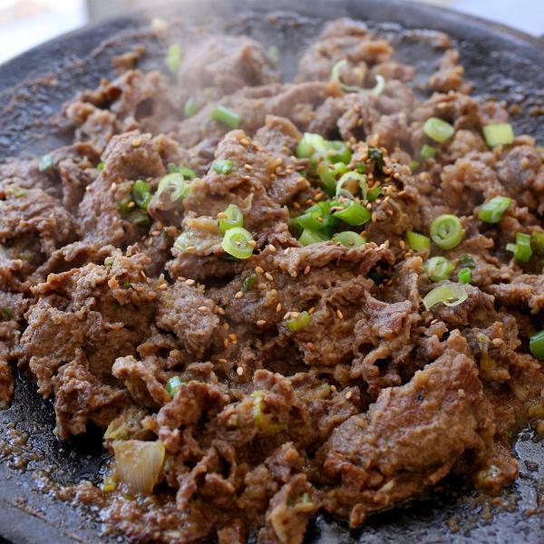 20. Marinated Beef (Bulgogi) · Marinated thin slices of choice cut rib eye. Served with side of rice, doenjang sauce, and banchan.