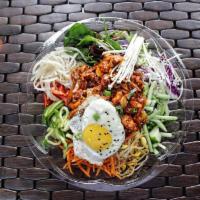 10. Spicy Pork Bowl (Bibimbap) · Fresh seasonal vegetables, spicy pork and an egg over steamed rice with bibimbap sauce on th...