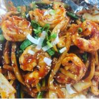 11. Stir Fried Shrimp · Served with side of rice and banchan. Spicy.