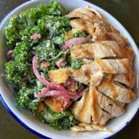 KALE SALAD · pickled onions, garlic croutons & parmesan add grilled chicken $4, add fried egg $2
