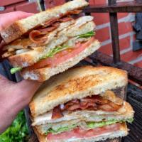 GRILLED CHICKEN TRIPLE DECKER · chicken paillard, bacon, lettuce, tomato & mayo on sourdough