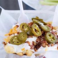 Reg. Fully Loaded Fries · Cheese, Ranch, Bacon bits and Jalapeños.
