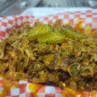 Carolina Fries  · Our fresh cut fries topped with slow smoked pulled pork crispy fries onions pickles and Caro...