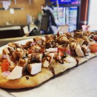 Bruschetta Chicken  · Traditional bruschetta tomato combo mixed with diced grilled chicken and drizzled balsamic g...