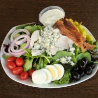 Cobb Salad · Turkey, bacon bits, onion, tomato, sliced boiled egg, cucumber, black olives and blue cheese.