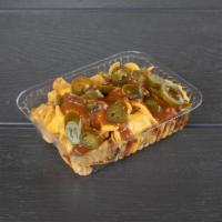 FRITO PIE  · FRITO PIE WITH CHILLY AND CHESSE 
JALAPENOS OPTIONAL 