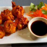 Bomb · Fried crispy thai dumping served with black ginger sauce