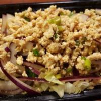Chicken Salad ( Larb) · Tradition spicy chicken salad. Ground chicken with roasted rice powder, chili powder, lime j...