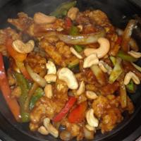 Nam Prik Pao with Crispy Chicken · Stir fried with chili paste, onion, scallion, bell pepper, and cashew nut. Spicy.