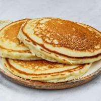#2 Pancakes · 2 eggs any style, bacon, sausage or ham, regular coffee, tea or juice.