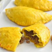Beef Patty · Jamaican Beef Patties Filled With Spicy Beef In A Buttery Flaky Crust. Comes With A Side Of ...