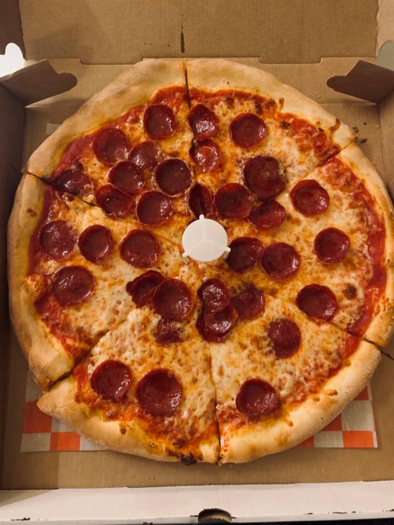 Pepperoni Pizza · Mozzarella, beef pepperoni and tomato sauce.