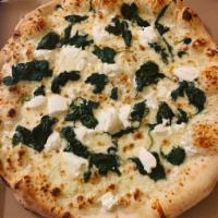 Spinach Cheese Pizza · Spinach topped with ricotta and mozzarella cheese.