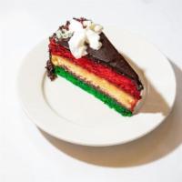 Rainbow Cake Slice · Three Colorful Sponge Cake Layers Filled With A Sweet Raspberry Jam And Almond Marzipan. Top...