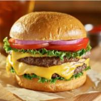 Cheeseburger Deluxe · Juicy 1/2 lb. Angus beef patty with fresh lettuce, tomatoes, onions, cheese, ketchup and mus...