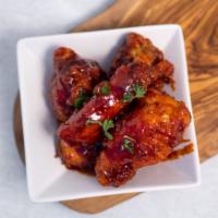 Korean ’yangnyeom’ Chicken Wings 5pc · Crispy fried chicken wings tossed in Korean sweet ＆ spicy sauce.