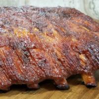 St Louis Style Ribs with Sage and Apple Chutney · Dry rubbed st. louis style ribs, oven roasted and topped with our signature sage and apple c...