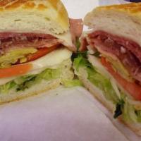 #6 The Godfather · Ham, salami, pepperoni, Provolone cheese, lettuce, tomato, onion, roasted peppers, oil & vin...