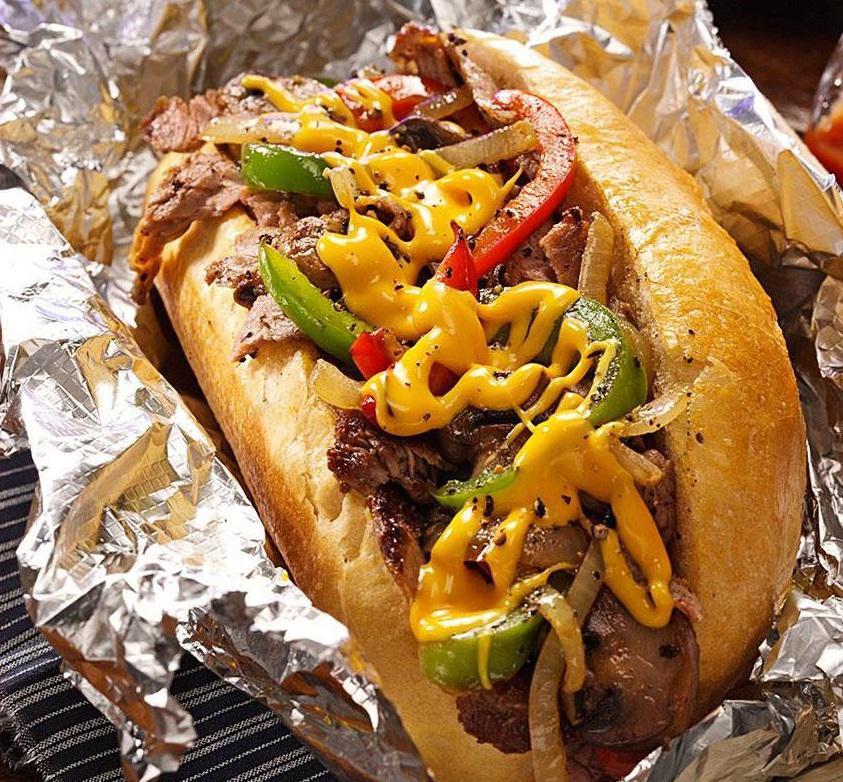 Philly Cheese Steak · Steak, American cheese, peppers and onions on a hero.