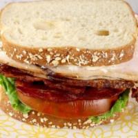Turkey Club · Turkey, bacon, lettuce, tomato and mayo.