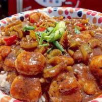 Smitty's Etouffee with BBQ Shrimp · A delicious meld of vegetables and fresh shrimp, marinated and cooked in a house made BBQ sa...