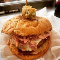 T&L Boudin Burger · A traditional boudin made with spicy, savory chicken, pork and rice seared as a patty with m...