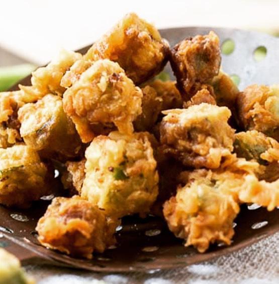 Southern Fried Okra · Fresh okra marinated in a buttermilk blend, lightly dredged in a crispy breading, fried and seasoned to perfection.