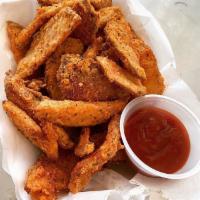 Red's Potato Fries · Sliced red potatoes dredged and seasoned in a crispy breading, fried to perfection and serve...