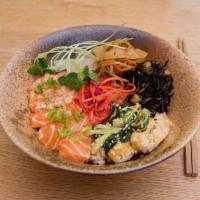 Salmon Rice Bowl · Kinpira, daikon pickles, gomaae, hijiki on Japanese or multigrain brown rice.
