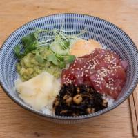 Wild Tuna Rice Bowl · Wasabi guacamole, cucumber, hikjiki seaweed, spicy aioli on Japanese rice.