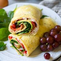 3. Veggie Wrap Breakfast · 2 eggs, onions, peppers, tomatoes, and mushrooms on a spinach wrap.