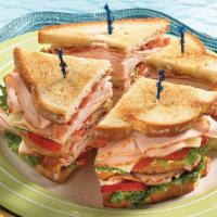 12. Turkey Club Hot Sandwich · Turkey breast, bacon, Swiss, lettuce, tomato, and mayo.