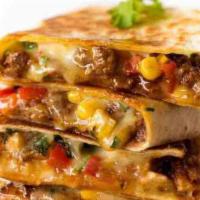 4. Veggie Quesadillas · Grilled peppers, grilled onions, grilled mushrooms, corn, jalapeno, mozzarella cheese, chedd...