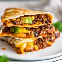 2. Steak Quesadillas · Steak, grilled peppers, grilled onions, cheddar cheese, mozzarella cheese with salsa.