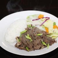 Bulgogi · Stir fried thin slices of beef, garnished with green onion. Served with rice and house salad.