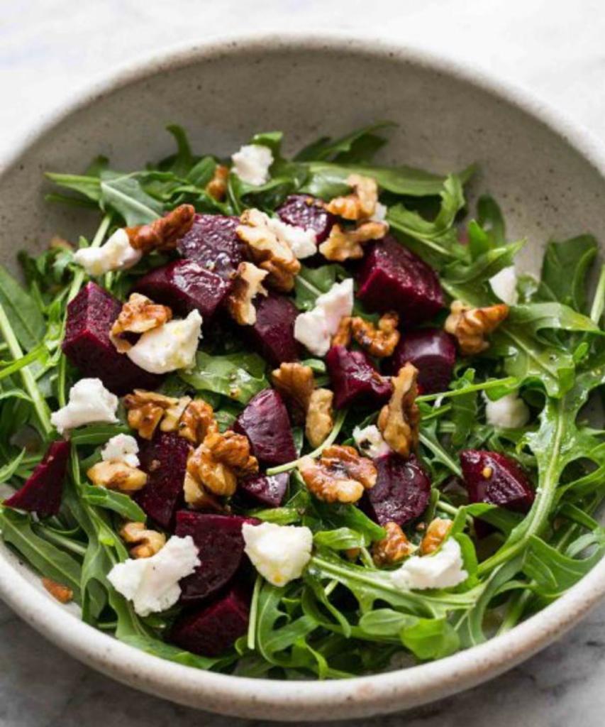 Garden salad · Marinated baked beets, arugula, goat cheese, onion, radishes, dill, walnuts. Comes with side of champagne vinaigrette