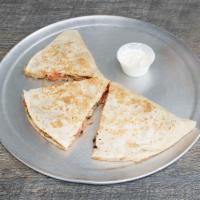 Quesadilla · Your choice of grilled flour or whole wheat tortilla filled with cheese and pico de gallo wi...
