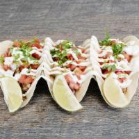 Baja Style Taco · Salsa, onions and cilantro. Soft flour or corn tortilla.