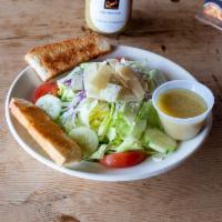 Coal's Signature Salad · Iceberg lettuce, red onions, tomatoes, cucumbers and shaved Parmigiano.