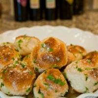 5 Garlic Knots · Rolled baked garlic bread. 