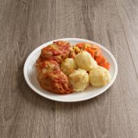 Golabki Plate · Cabbage roll with meat filling. Served with mashed potatoes, carrots with apples, onions and...