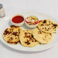 Al Pastor con Queso Pupusa · Marinated pork with pineapple and cheese.